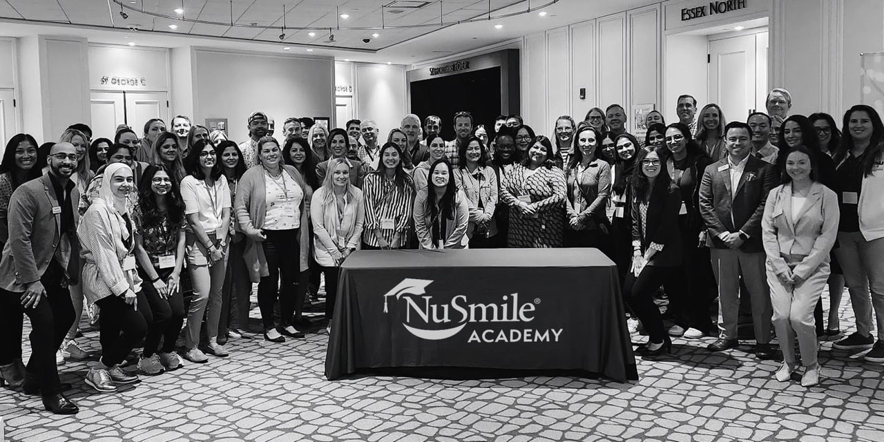 Pediatric dental residents and faculty participating in a NuSmile Academy educational program