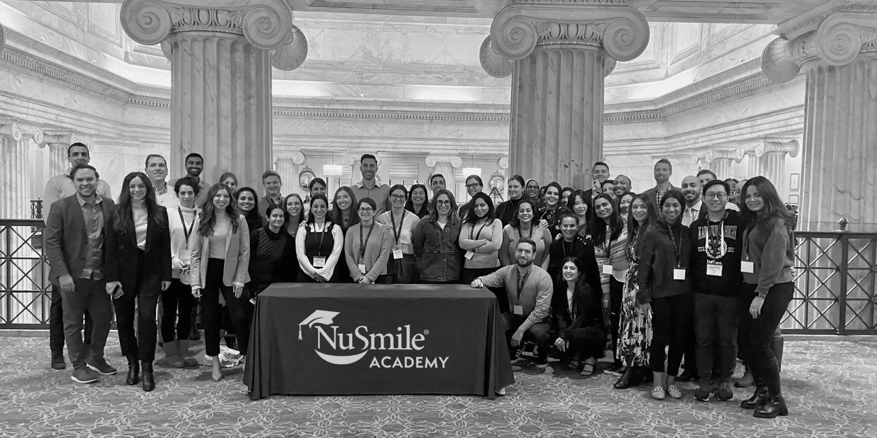 Pediatric dental residents and faculty gathered at a NuSmile Academy Workshop